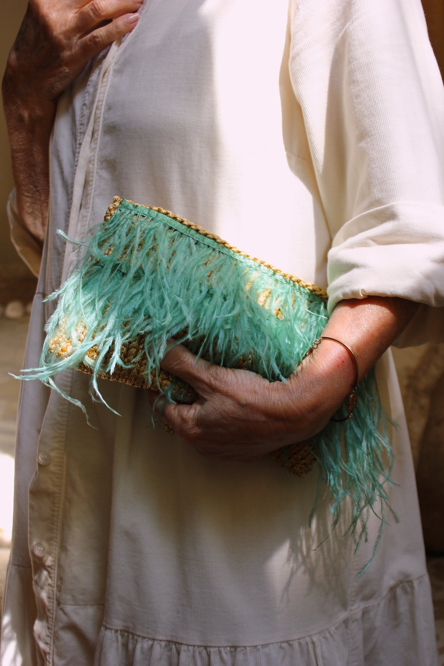 FEATHERED CLUTCH