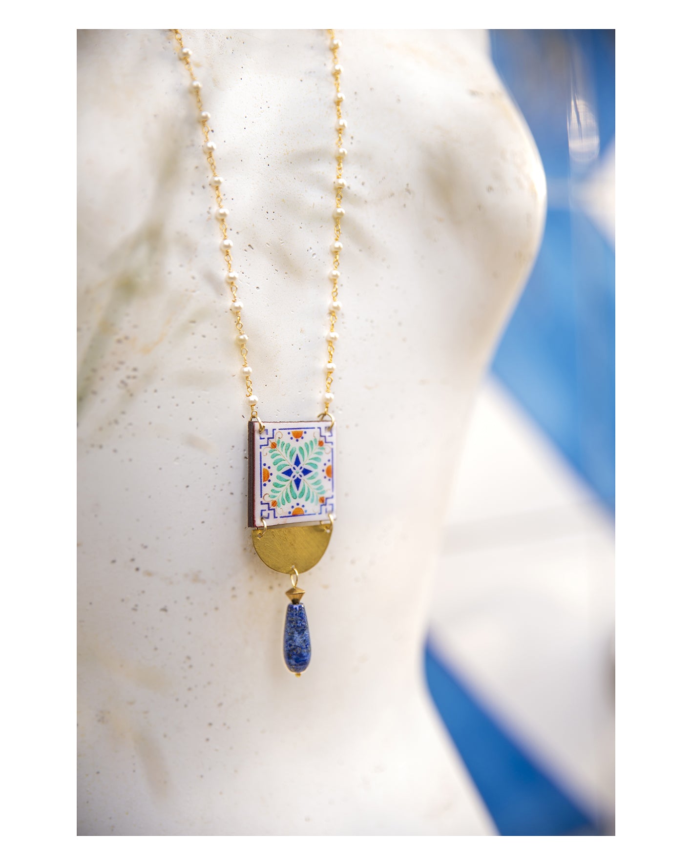 Necklace with lapis lazuli stone, brass semicircle, brass chain