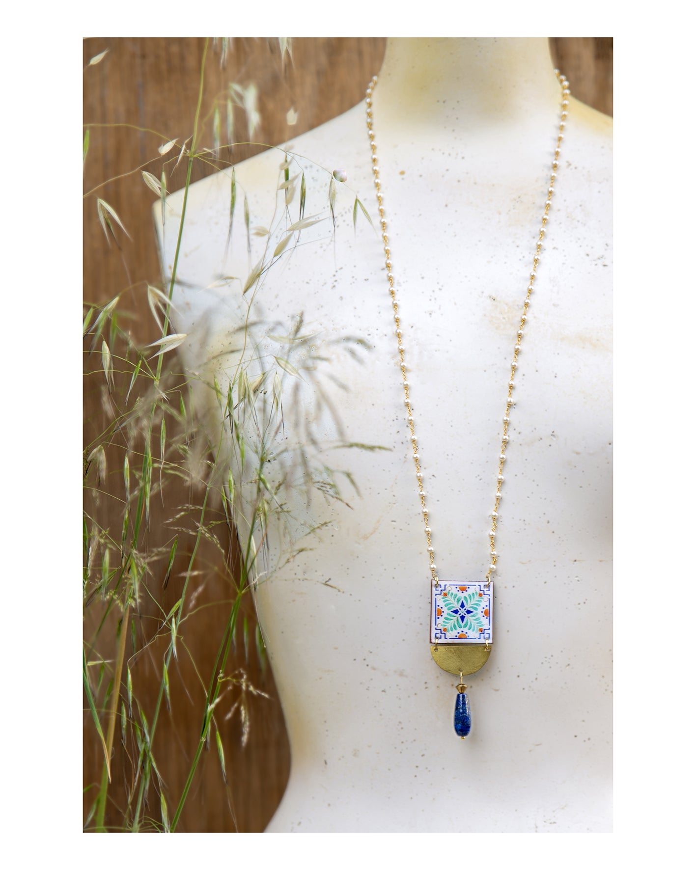 Necklace with lapis lazuli stone, brass semicircle, brass chain