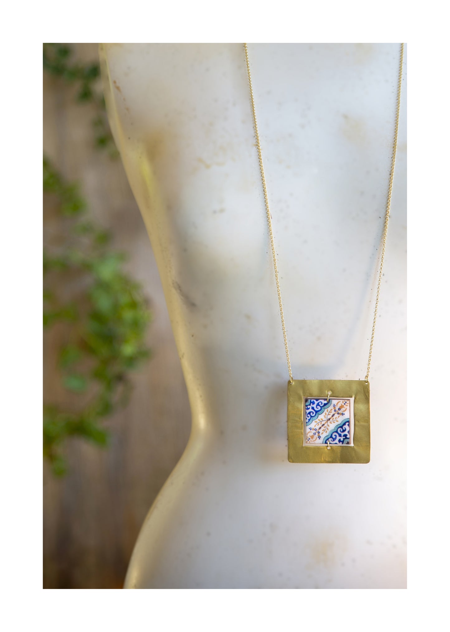 Necklace with brass frame