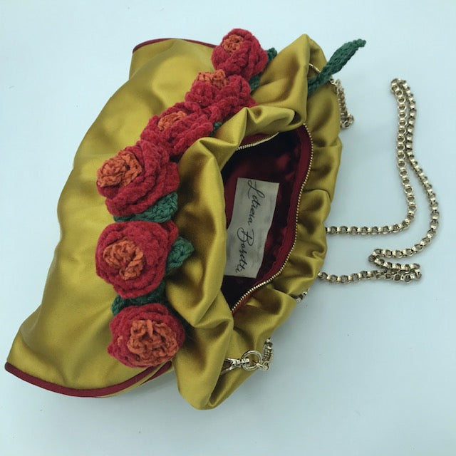 Red roses golden yellow satin bag
