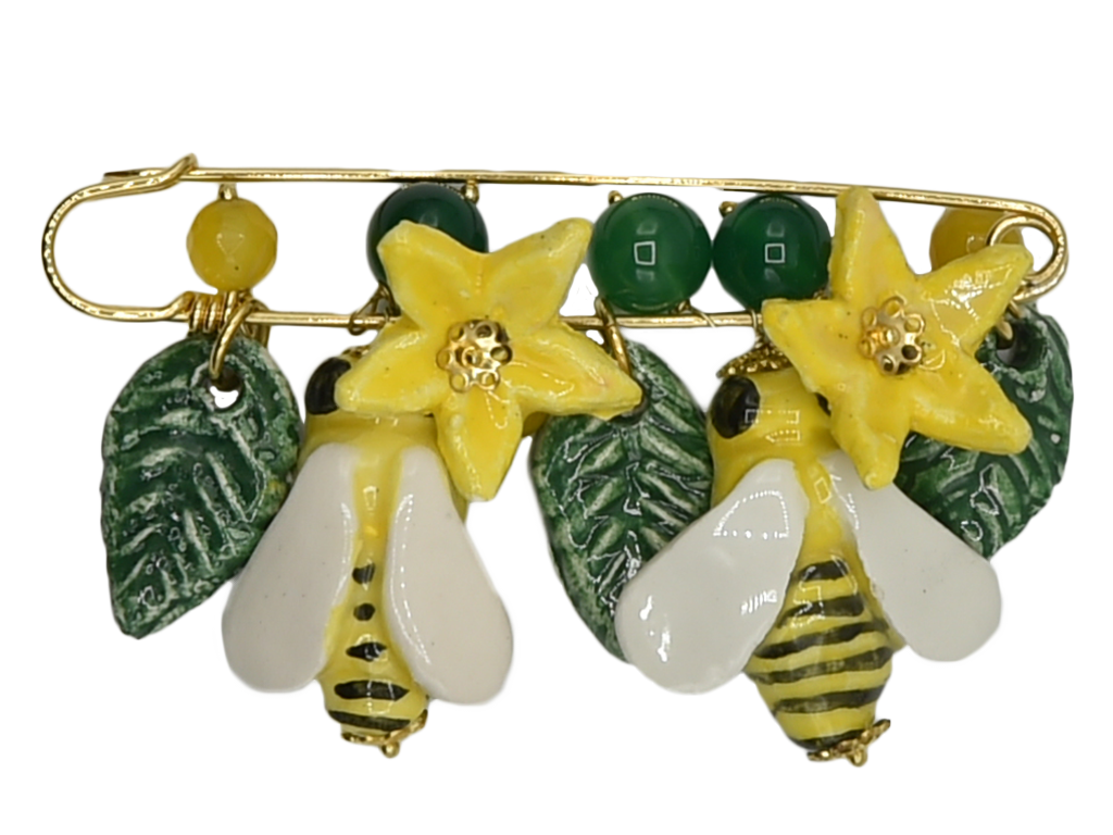 Golden brooch with bees, flowers and hanging leaves
