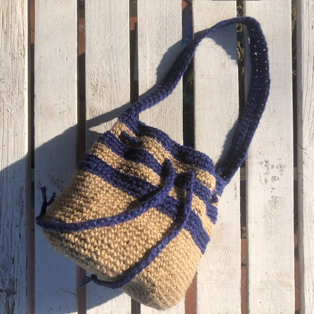 Bucket bag in crochet work rope.