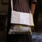 SMALL-STRIPED MESSENGER BAG