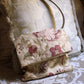 RUST-COLORED PATTERNED SHOULDER BAG