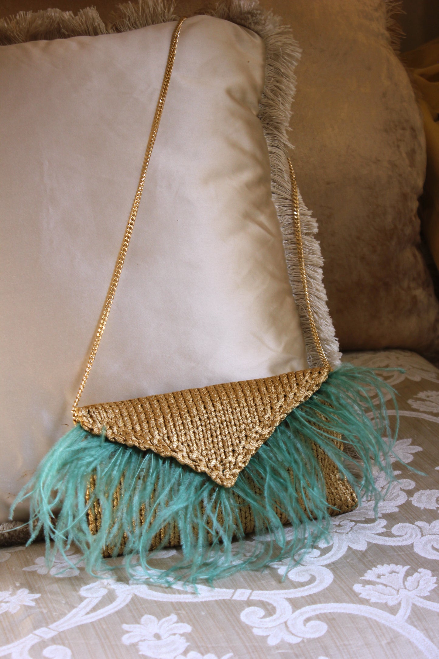 FEATHER CLUTCH