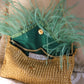 FEATHER CLUTCH