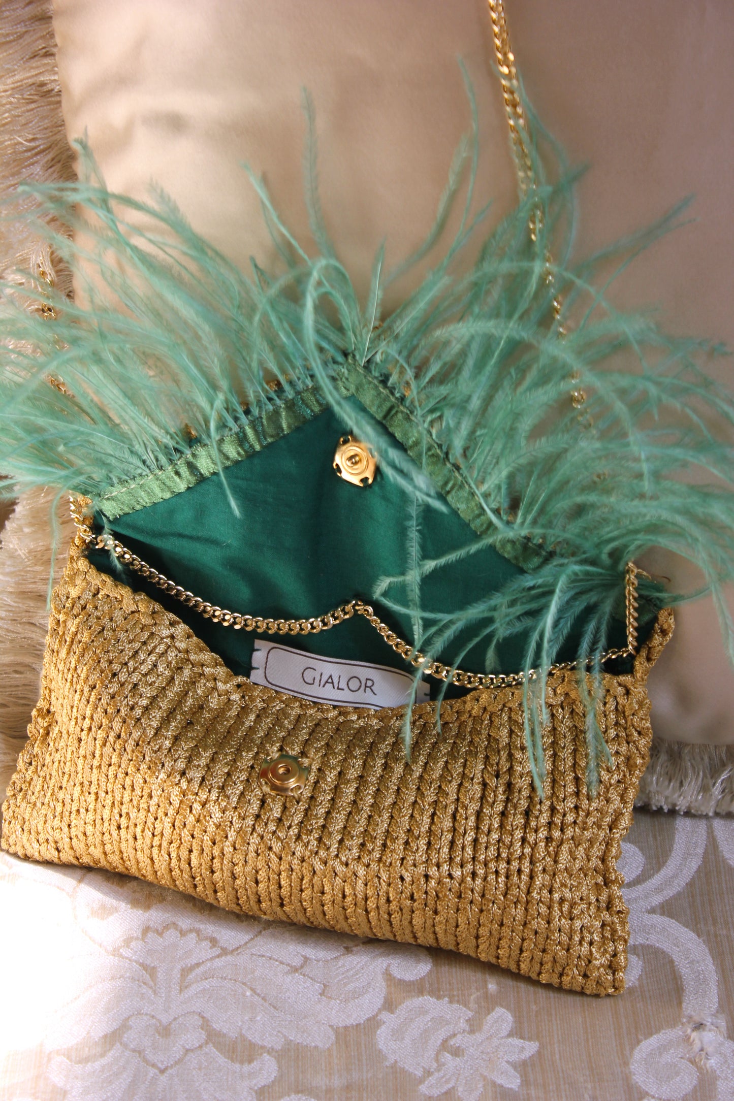 FEATHER CLUTCH