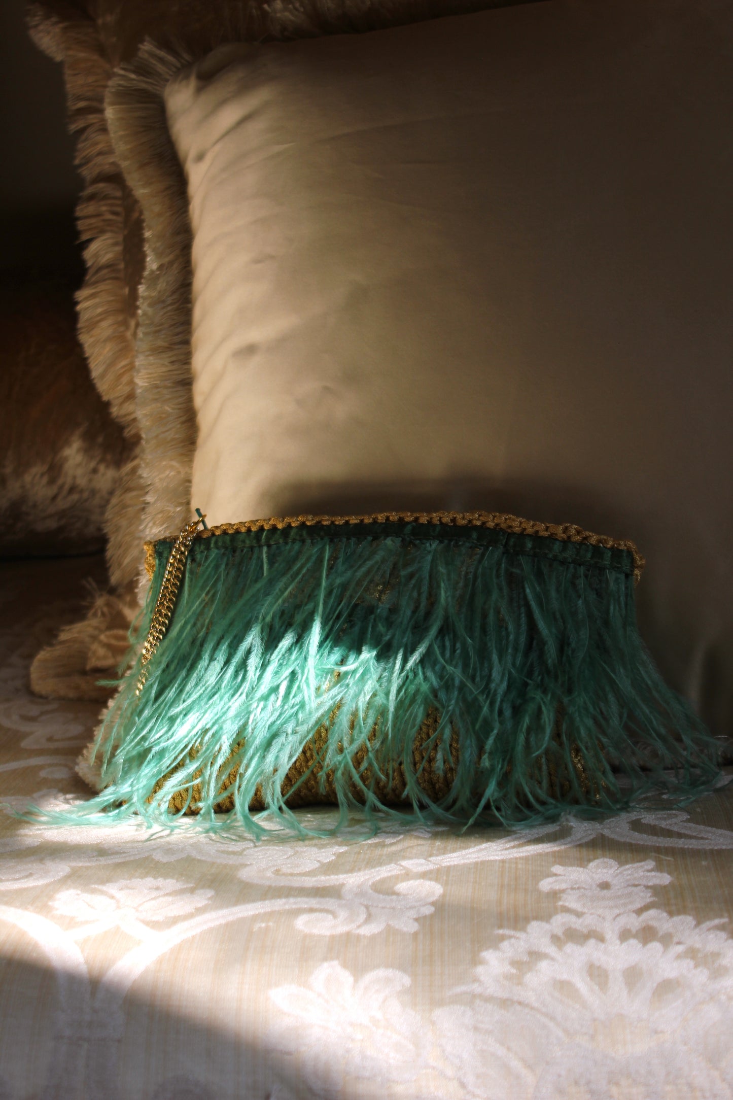 FEATHERED CLUTCH