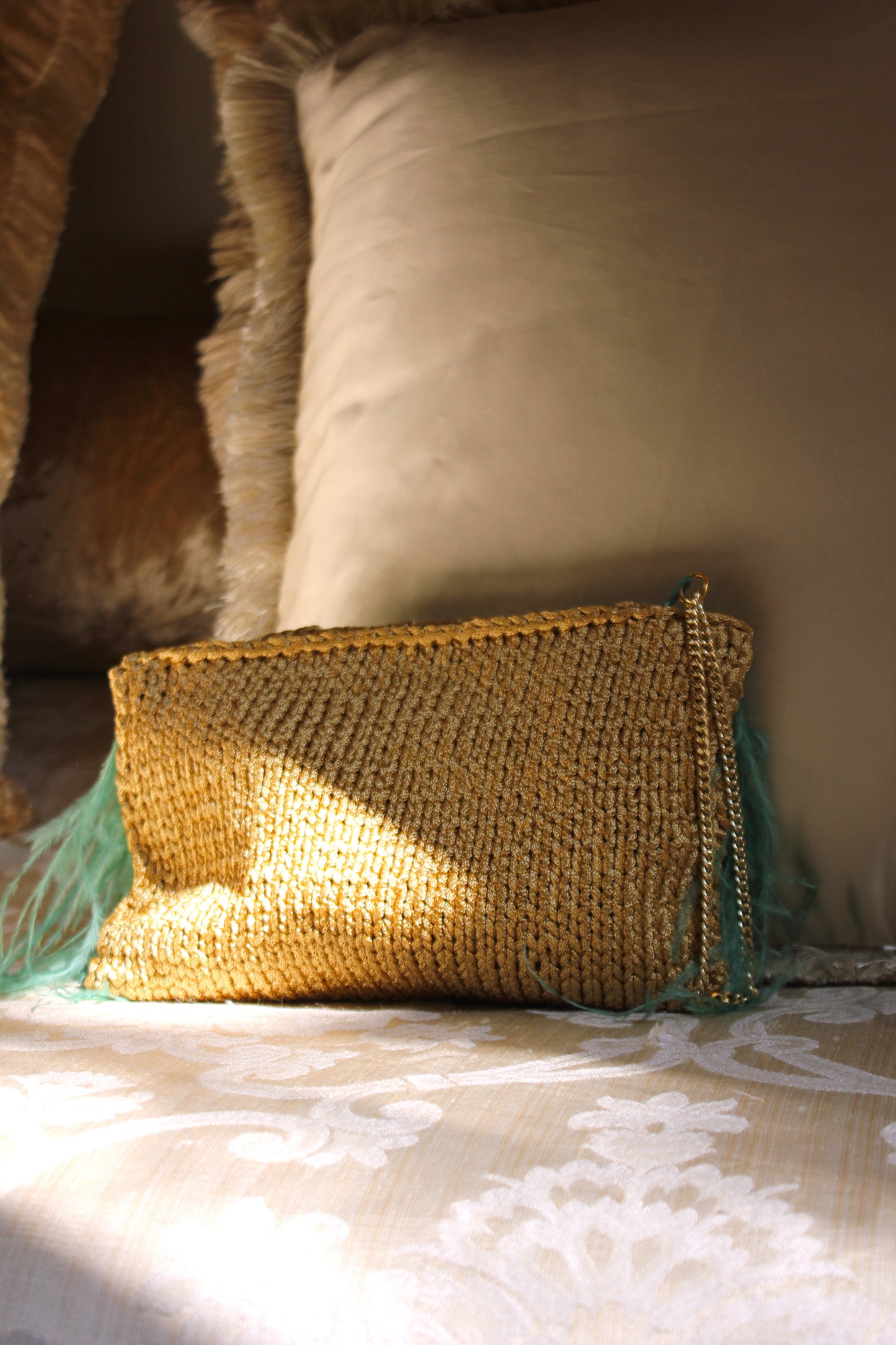 FEATHERED CLUTCH