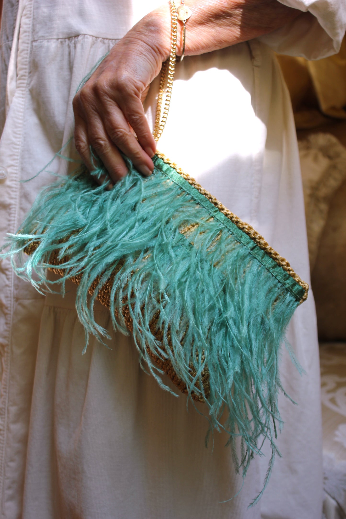 FEATHERED CLUTCH