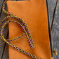 Yellow and orange suede cross body bags