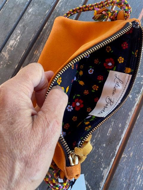 Yellow and orange suede cross body bags