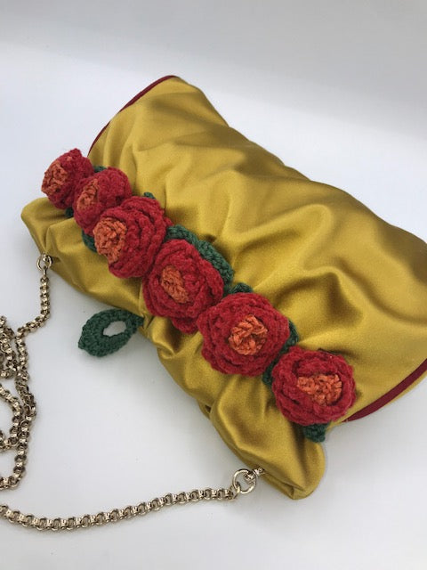 Red roses golden yellow satin bag