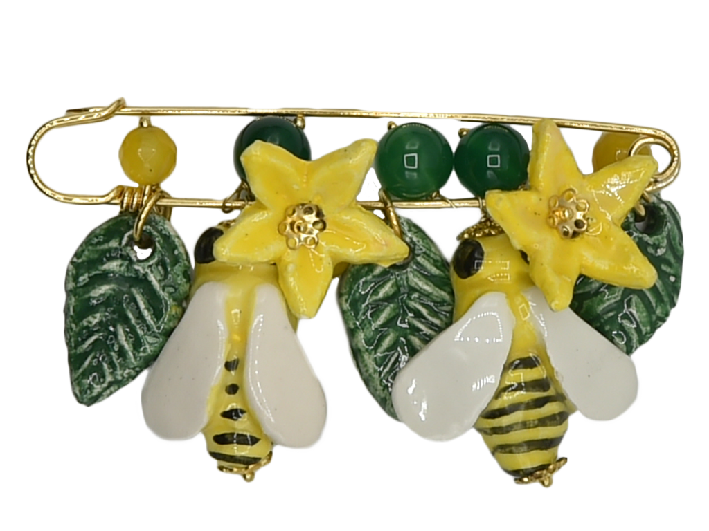 Golden brooch with bees, flowers and hanging leaves 